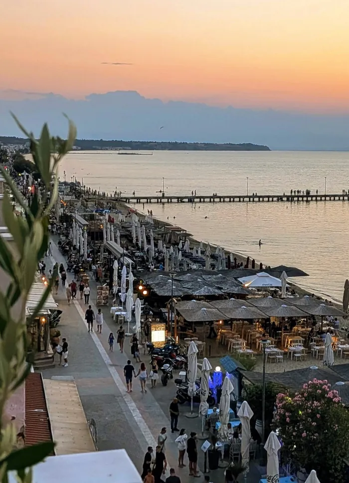 Perea’s waterfront restaurants and promenade from above at sunset
